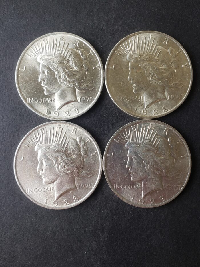 Lot of Four 1923 $1 Peace Silver Dollars