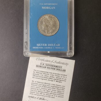 1887 O $1 Morgan Silver Dollar in a Plastic Holder