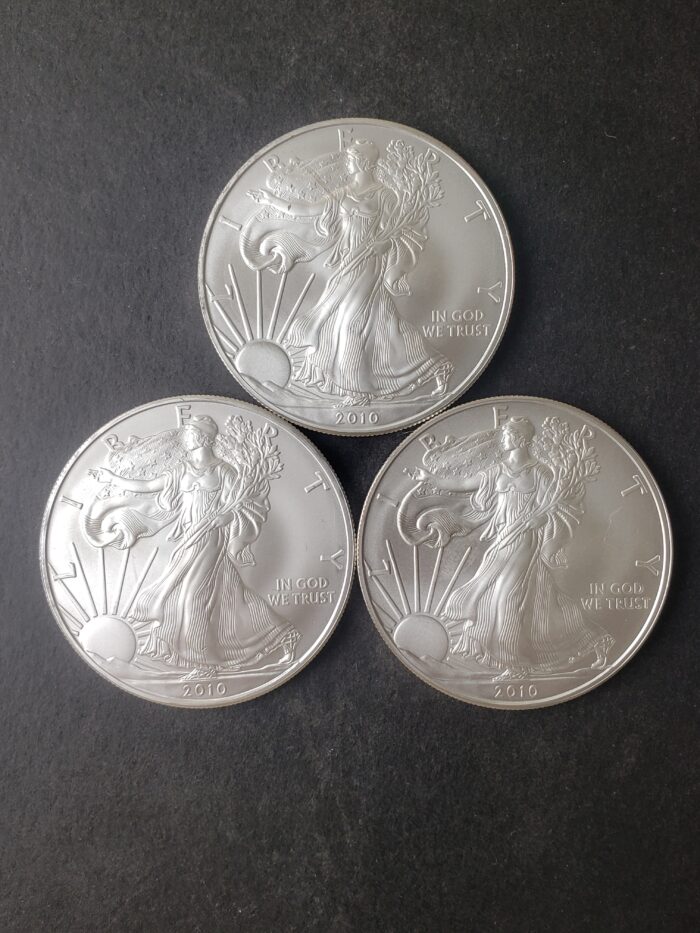 Lot of Three 2010 $1 American Silver Eagle Dollars