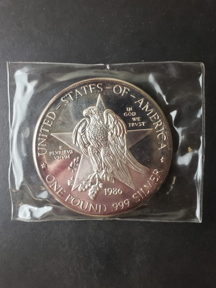 1986 14.58oz Silver Texas Round in Plastic at $1/oz Over Spot