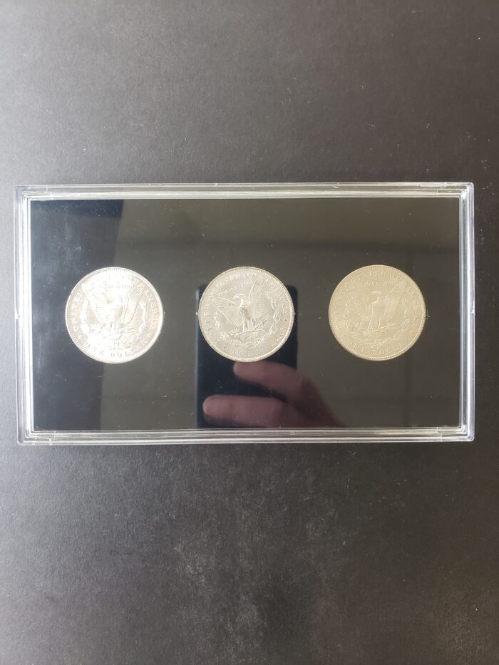 Three $1 Morgan Silver Dollars in a Plastic Holder - Image 2